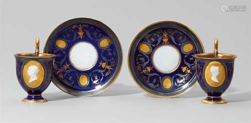 A pair of Nymphenburg porcelain cups with portraits of Max I and Karoline of BavariaModel no. 280