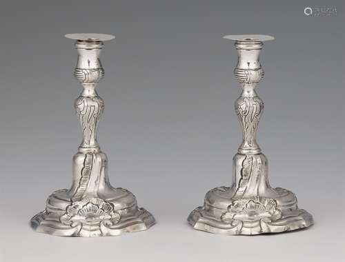 A pair of miniature silver candlesticksSilver Baluster-form shafts with shellwork décor issuing from