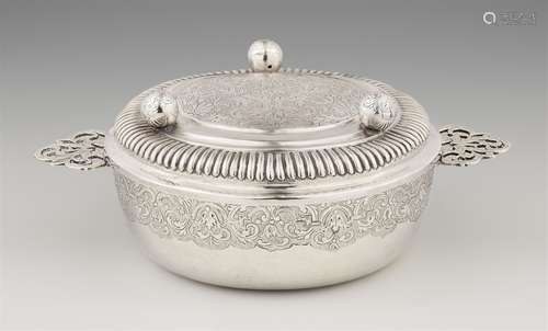 An Osnabrück silver ecuelleSilver. A slightly tapering dish with pierced handles and engraved