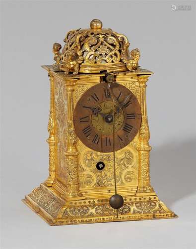 A rare Munich table clockChased brass, cast iron and copper clock. Day running with hourly