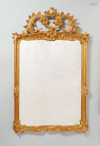 A Rococo giltwood frameCarved softwood frame with later mirror pane. Re-gilt. H 143, W 88.5, inner