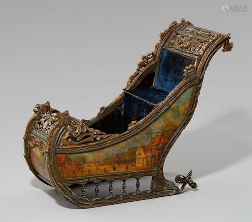 A Dutch child's sledPolychrome wood with iron mountings and later blue velvet seat cover. Richly