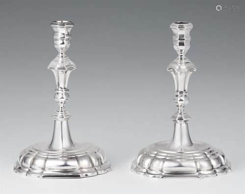 A pair of Lower Saxon silver candlesticksSilver. Baluster-form shafts issuing from square bases.