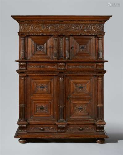 A Dutch “Hollandse kast” cabinetSolid oak and ebony cabinet. The upper and lower sections each