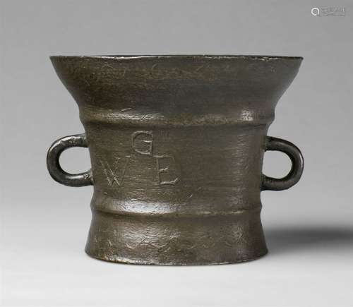 An early English mortar monogrammed GWECast bronze with slightly dull brown patina. Tapering form