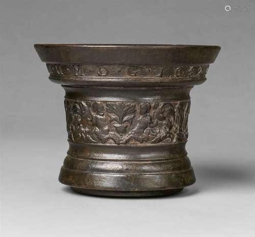 A signed Netherlandish mortar with grotesques from 1642Thick cast bronze with reapplied dark brown