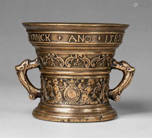 A magnificent Netherlandish mortar with zoomorphic handlesReddish gold cast bronze with polished