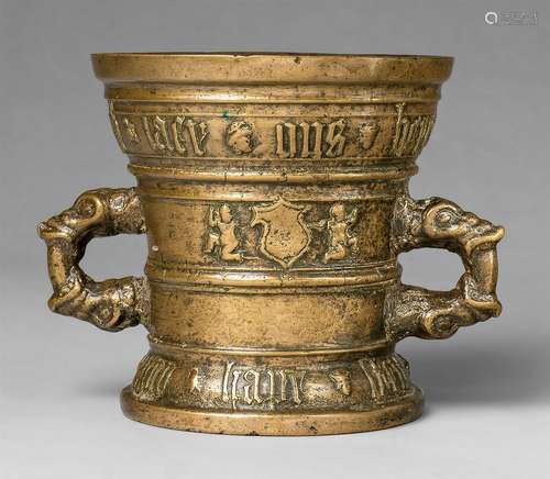 A dated Hachmann mortar with dog and rabbit decorGolden brown cast bronze with natural patina. The