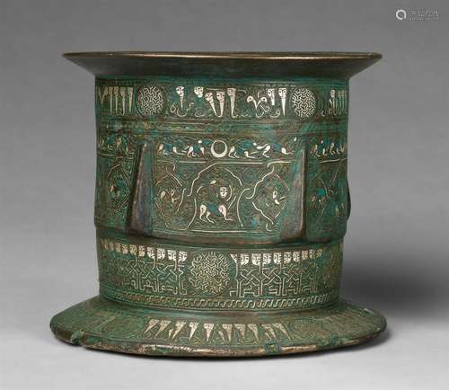 A magnificent mortar with sphinx motifsChased cast bronze with silver damascening and minor remnants