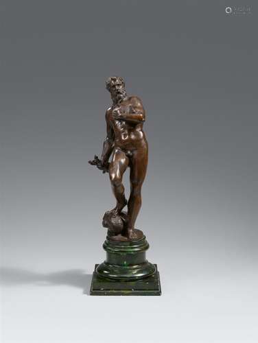 A 17th century Italian bronze figure of ZeusCast in the round with old patina.. A nude figure of the