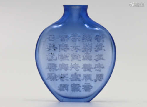 A Chinese blue inscribed glass snuff bottle