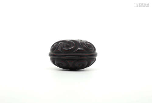 A Chinese black “tixi” lacquer circular box and cover