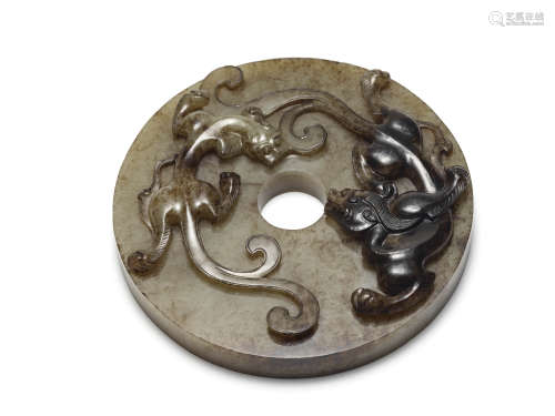 A Chinese Relief Dragon and Taotie Pattern Jade Bi
