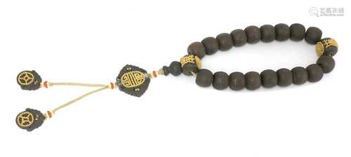 A Chinese wooden bead rosary,