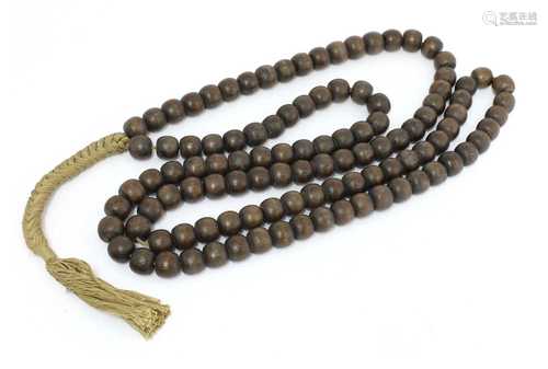 A string of Chinese wooden beads,