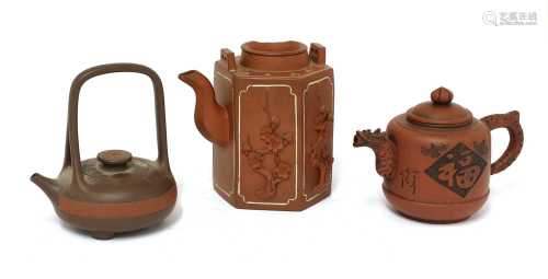 A collection of three Chinese Yixing zisha teapots,
