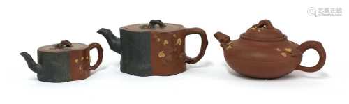 A collection of three Yixing Zisha teapots,