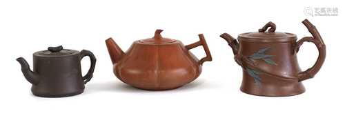 A collection of three Chinese Yixing zisha teapots,