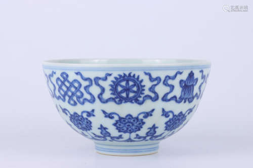 A Chinese blue and white wrapped floral “babao” porcelain bowl