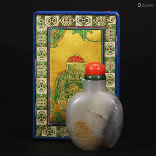 A Chinese light greenish white jade Snuff Bottle