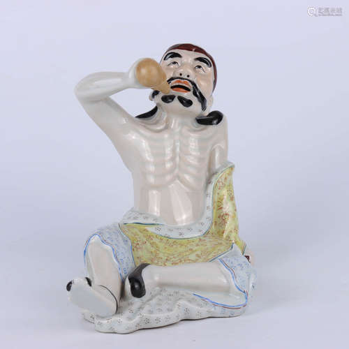 A chinese porcelain figural statue