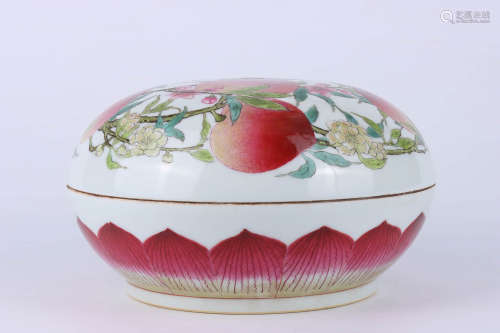 A Chinese famille rose “peach” lidded porcelain box