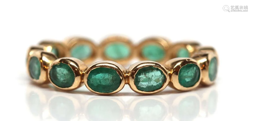 Emerald, 18k yellow gold eternity band