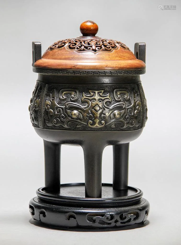 A Chinese Gilt Bronze Tripod Censer