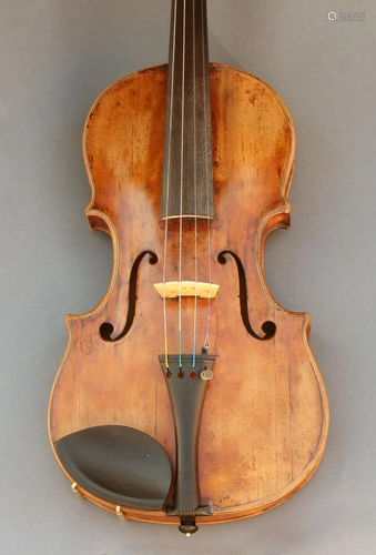 An antique violin, having a maple body wit…