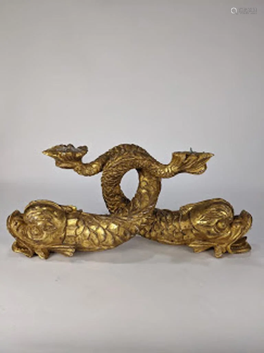 A continental giltwood carved candela…