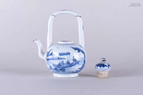 A Chinese blue and white handled teapot an…