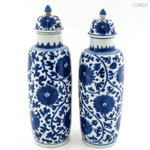 A Pair of Blue and White Vases with Cover