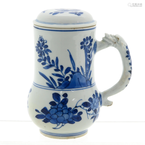 A Blue and White Mug with Cover