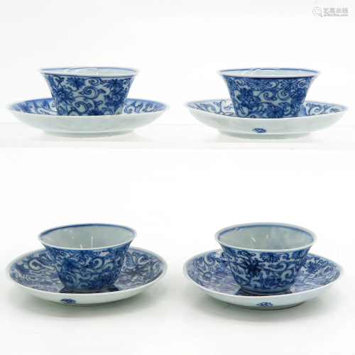 Four Blue and White Cups and Saucers