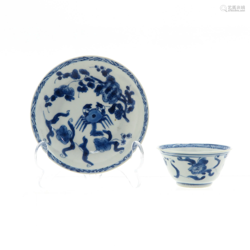 A Blue and White Cup and Saucer