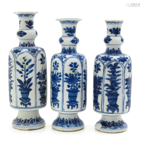 Three Small Blue and White Vases