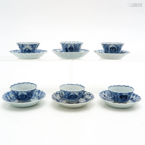 Six Blue and White Cups and Saucers