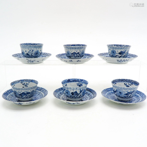 Six Blue and White Cups and Saucers