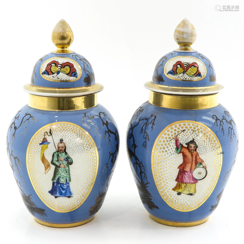 A Pair of Vases with Covers