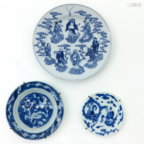 Three Blue and White Plates