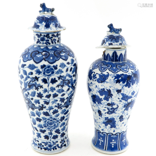 A Pair of Garniture Vases with Covers