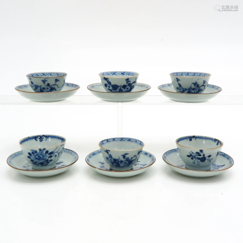 Six Blue and White Cups and Saucers