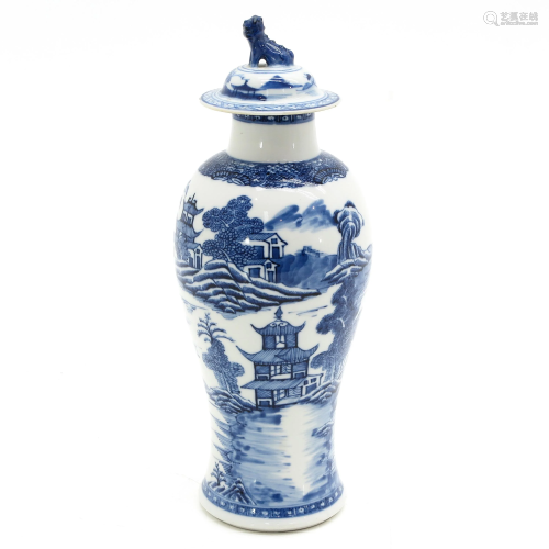 A Blue and White Vase and Cover
