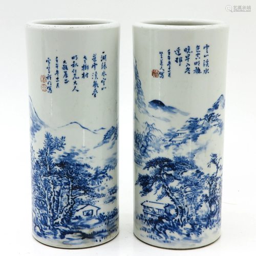 A Pair of Blue and White Cylinder Vases