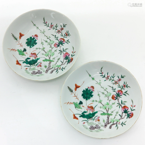 A Pair of Polychrome Decor Plates