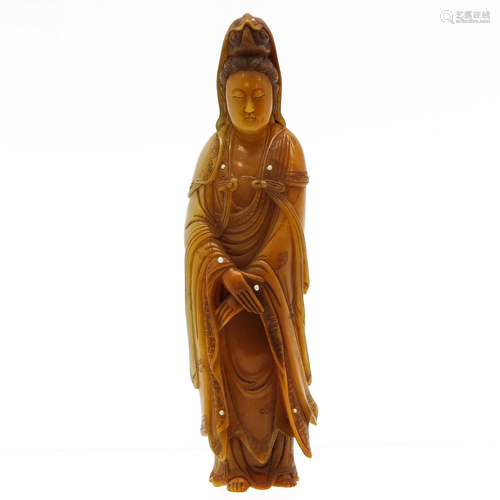 A Carved Jade Quanyin Sculpture