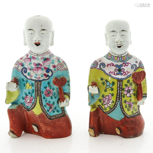 A pair of Famille Rose Figures