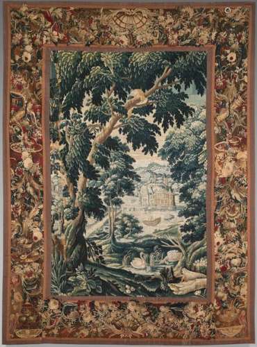Tapestry decorated with a castle surrounded by a m…