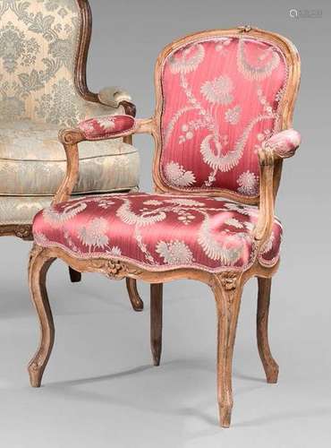 Moulded walnut cabriolet armchair carved with bunc…