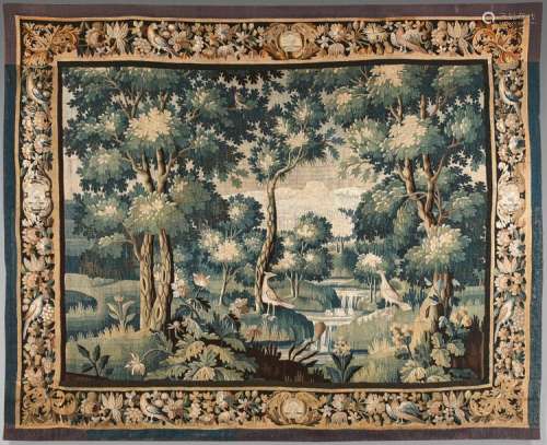 Green tapestry decorated with waders in a vast woo…